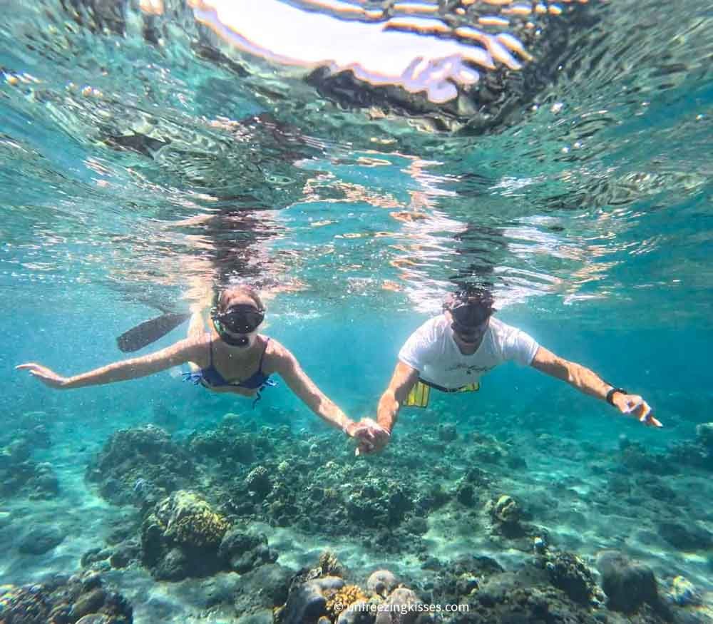 A couple snorkeling in Amed Bali 