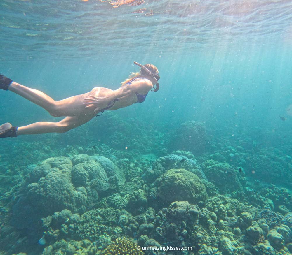 A woman snorkeling in Amed Bali 