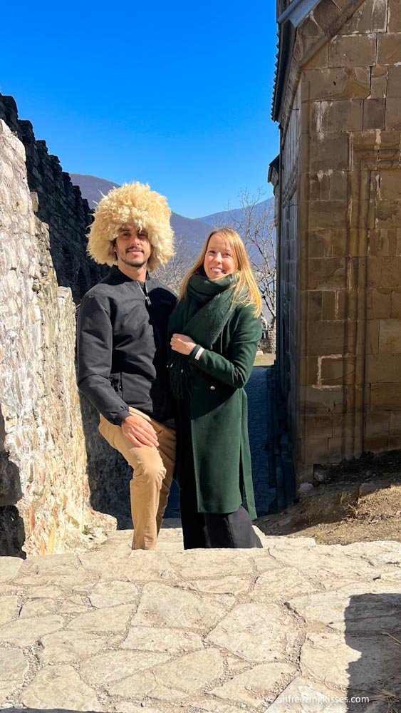 A couple in the Ananuri Fortress Georgian Military Highway