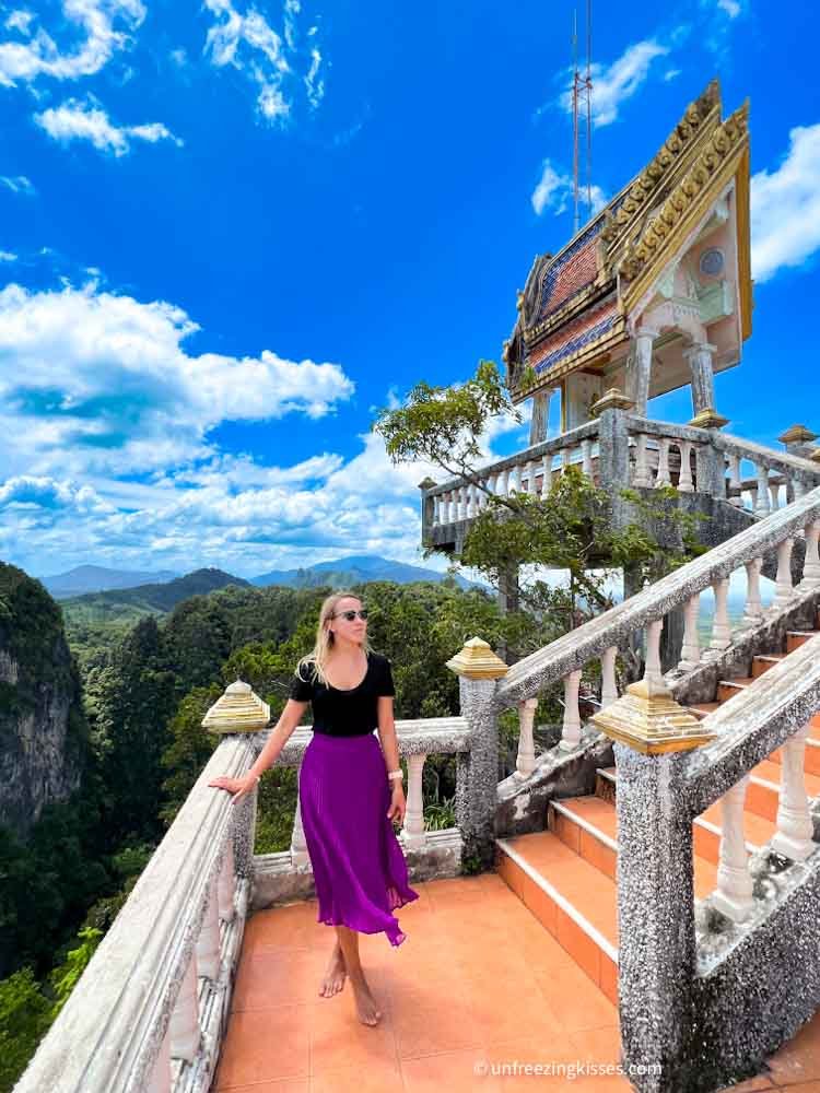 A woman on the top of the Tiger Cave Temple Krabi Thailand