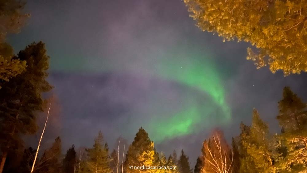 Aurora Borealis through clouds